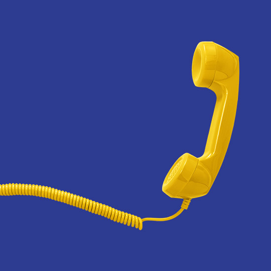Important Contacts; Yellow retro telephone handset with coiled cord on a solid blue background. The image is bold and vibrant, conveying a sense of nostalgia.